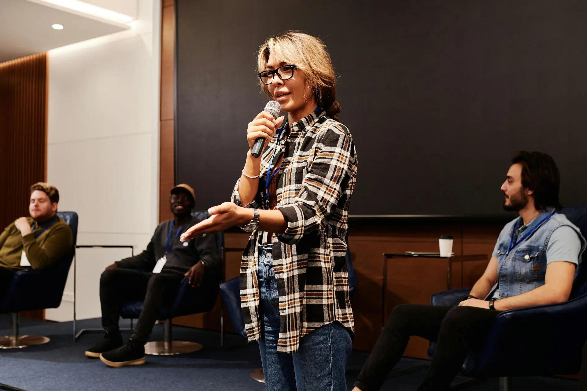 Speaker speaking at an idea sharing session.