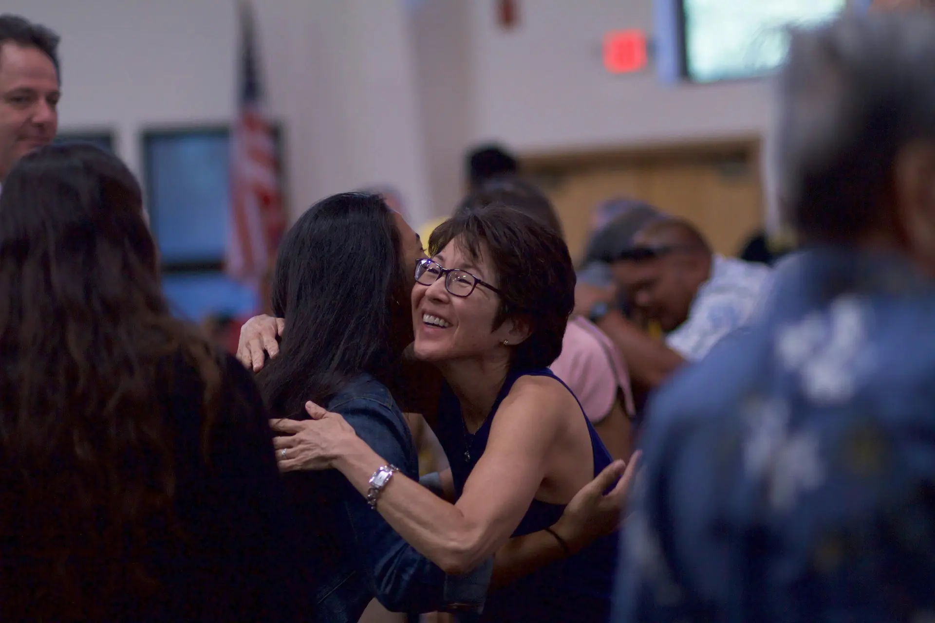 Women hugging each other when they met