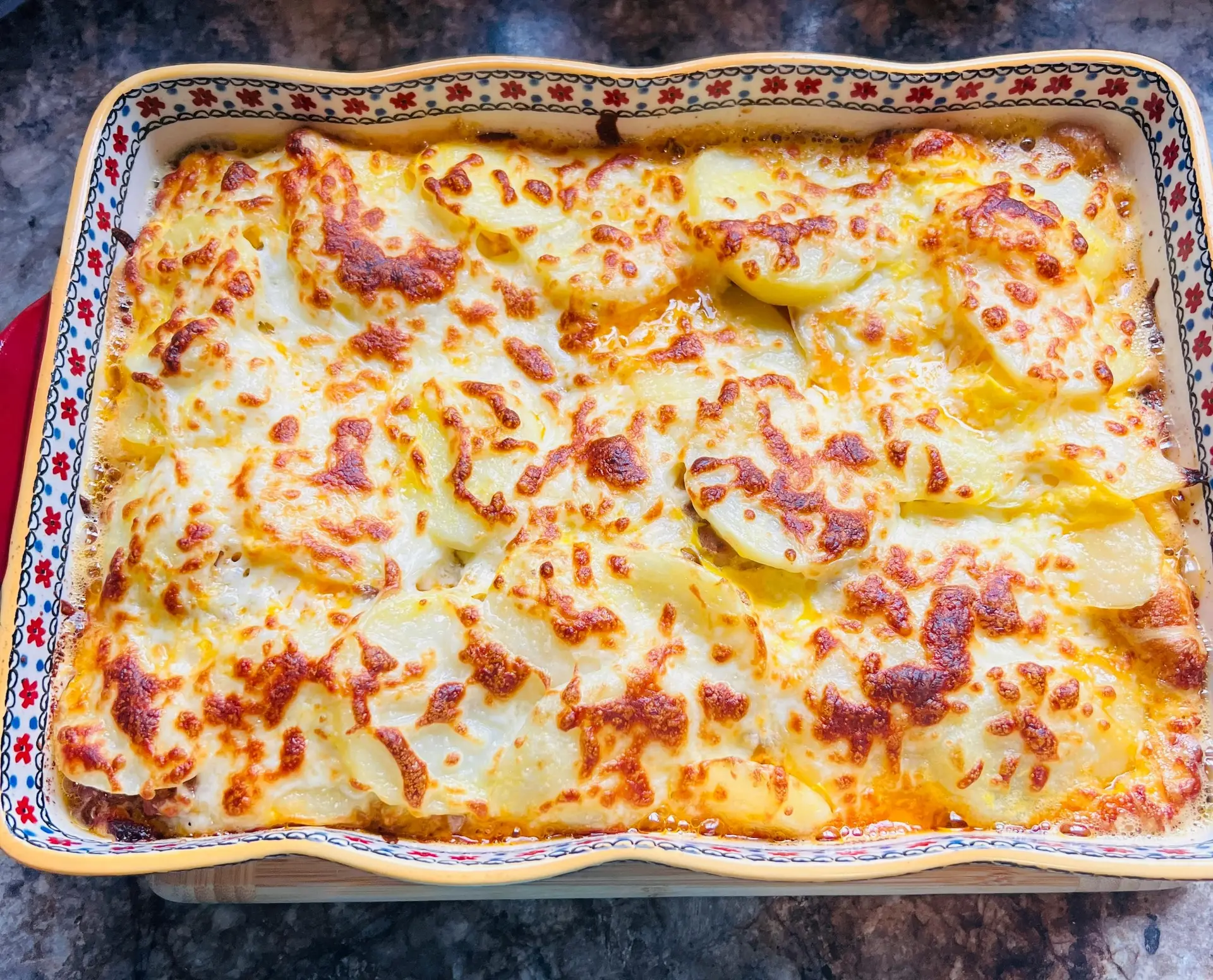 Potato gratin in a ceramic bowl.