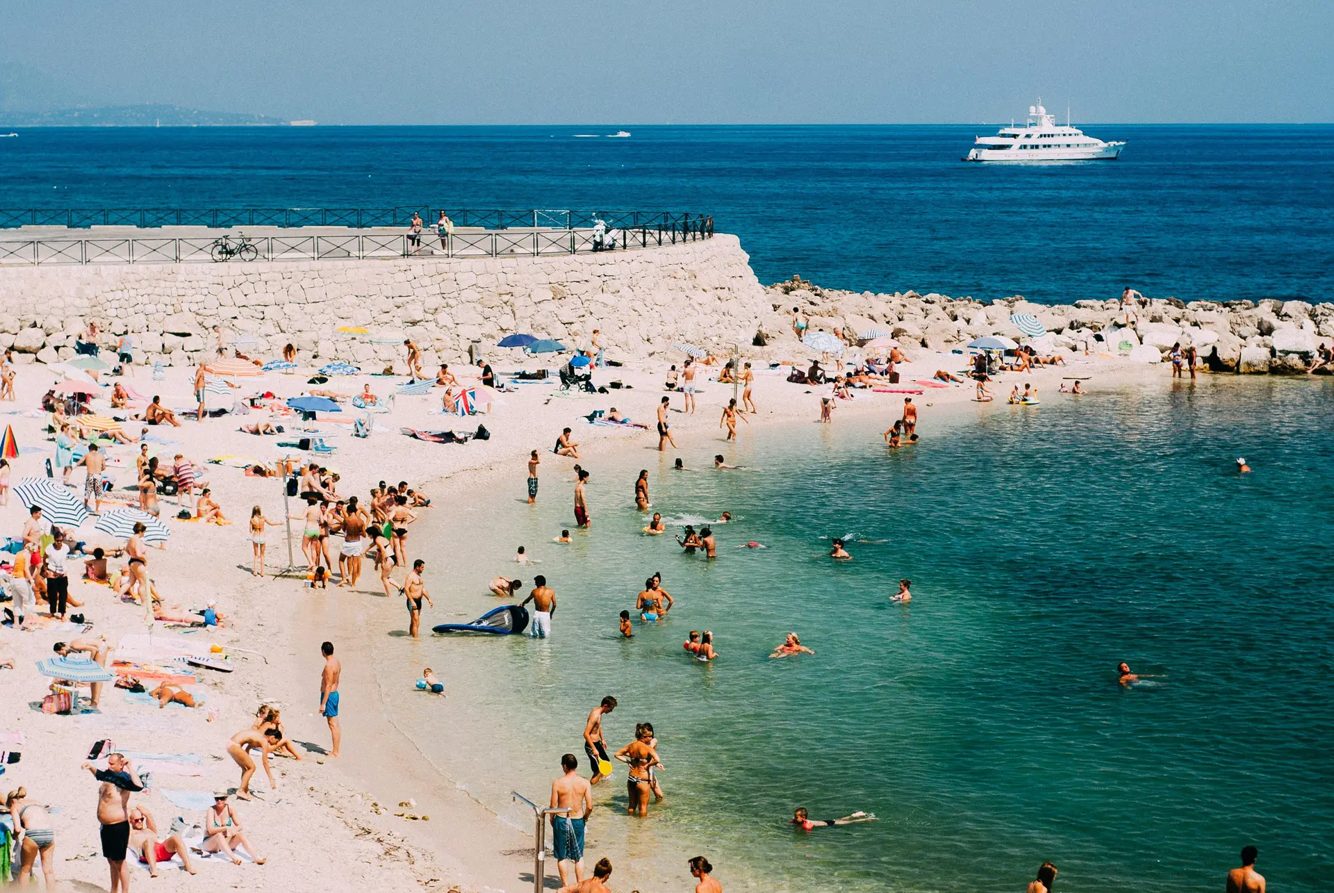 A beach crowded with people.