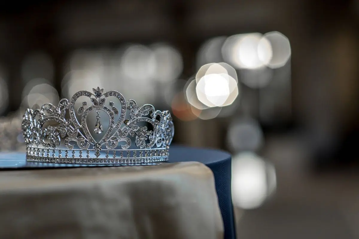 A tiara is placed on a table.