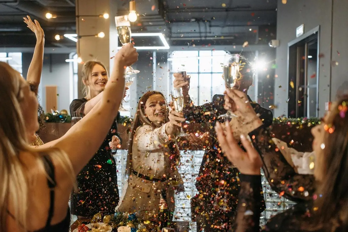 People partying on New Year's Day indoors.