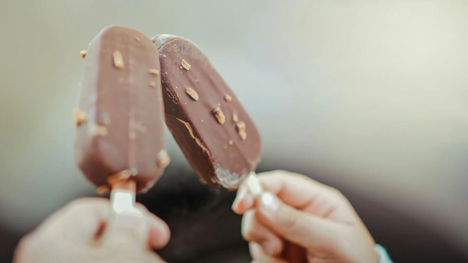 Doing cheer with Chocolate coated ice cream bars.