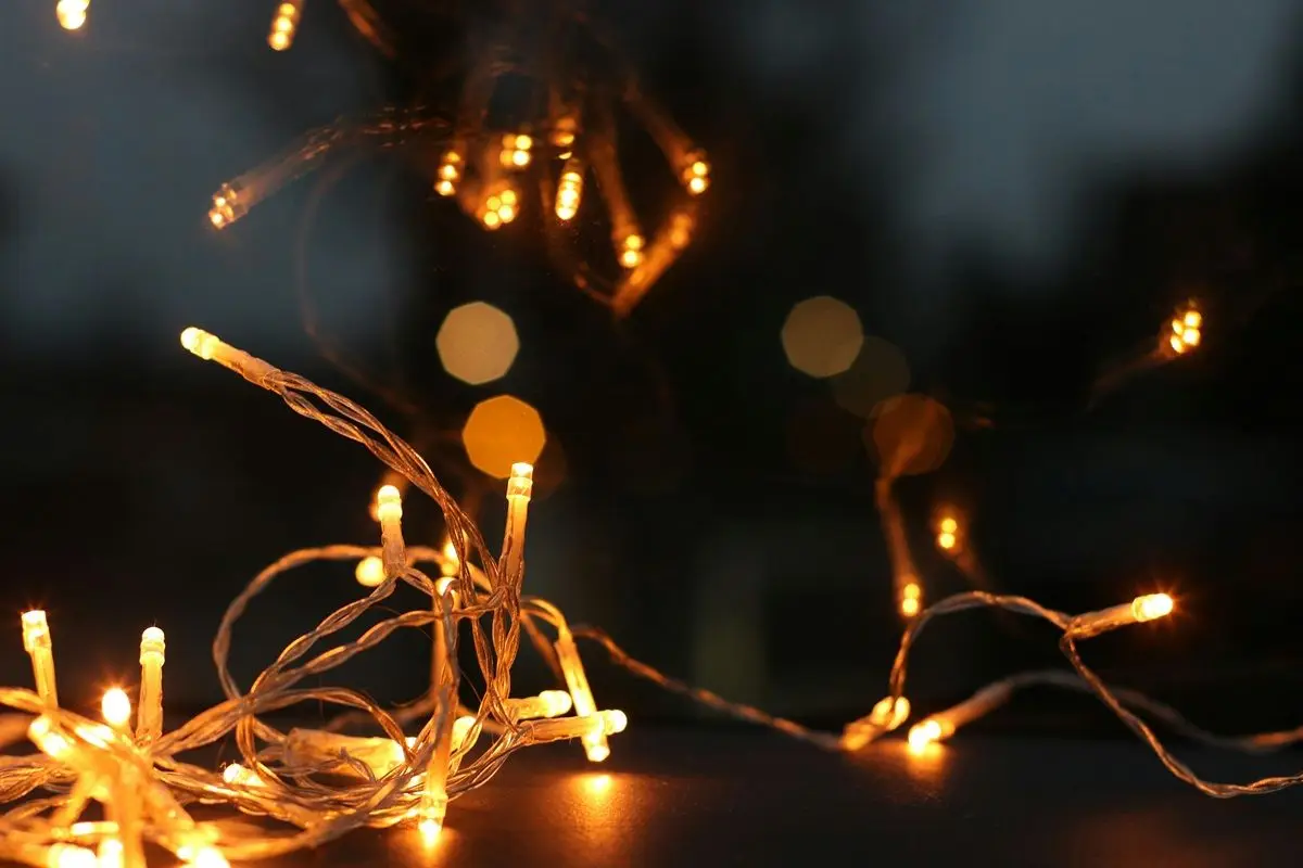 A lit string light.