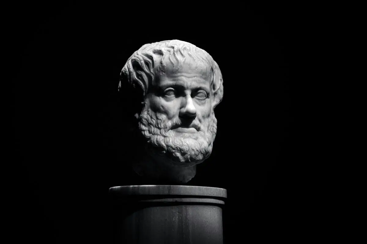 Aristotle bust placed on a cement altar.