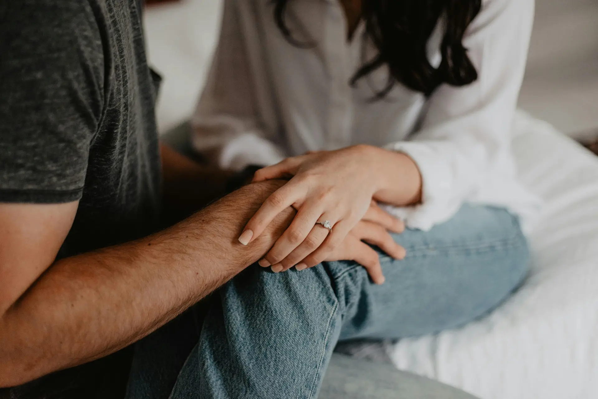A couple's hand on hand