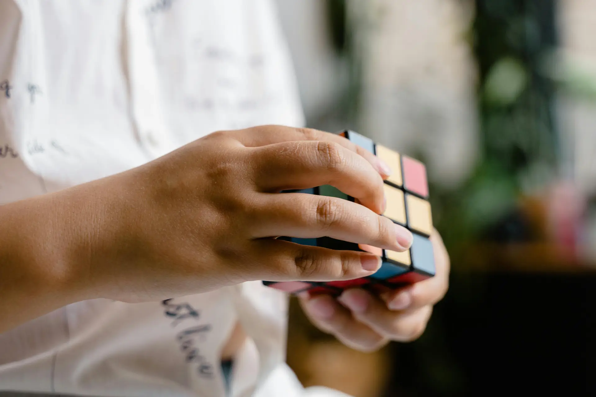 A kid solving rubic's cube