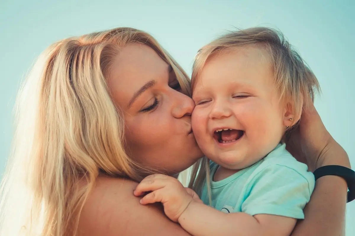 A-mother-kissing-her-baby.jpg