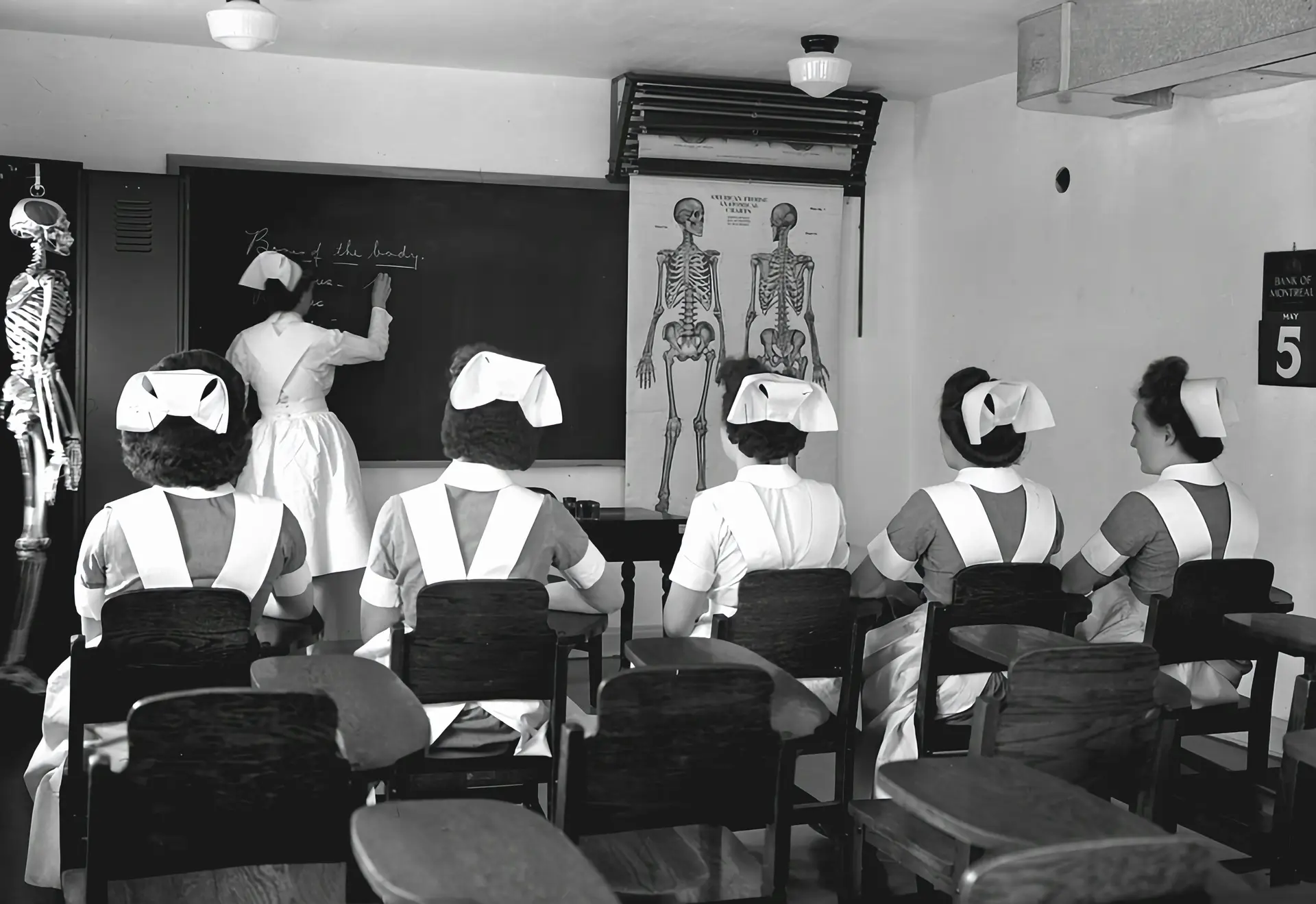 Old historic photo of nurses being trained.