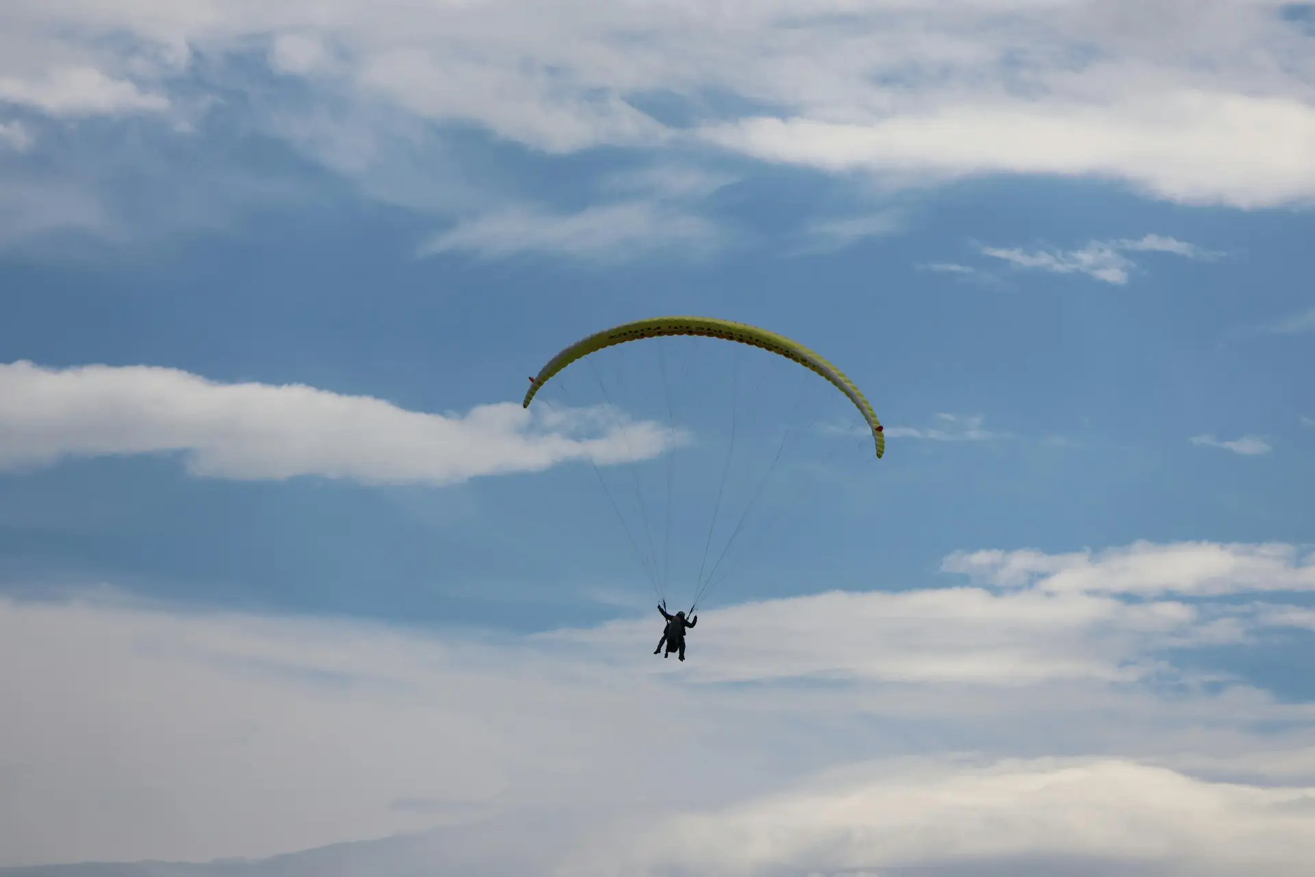 A Paraglider parachuting.