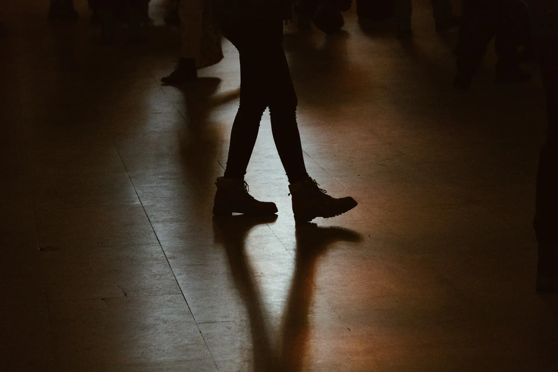 A person's leg and shoe is only shown, implying they're tap dancing.