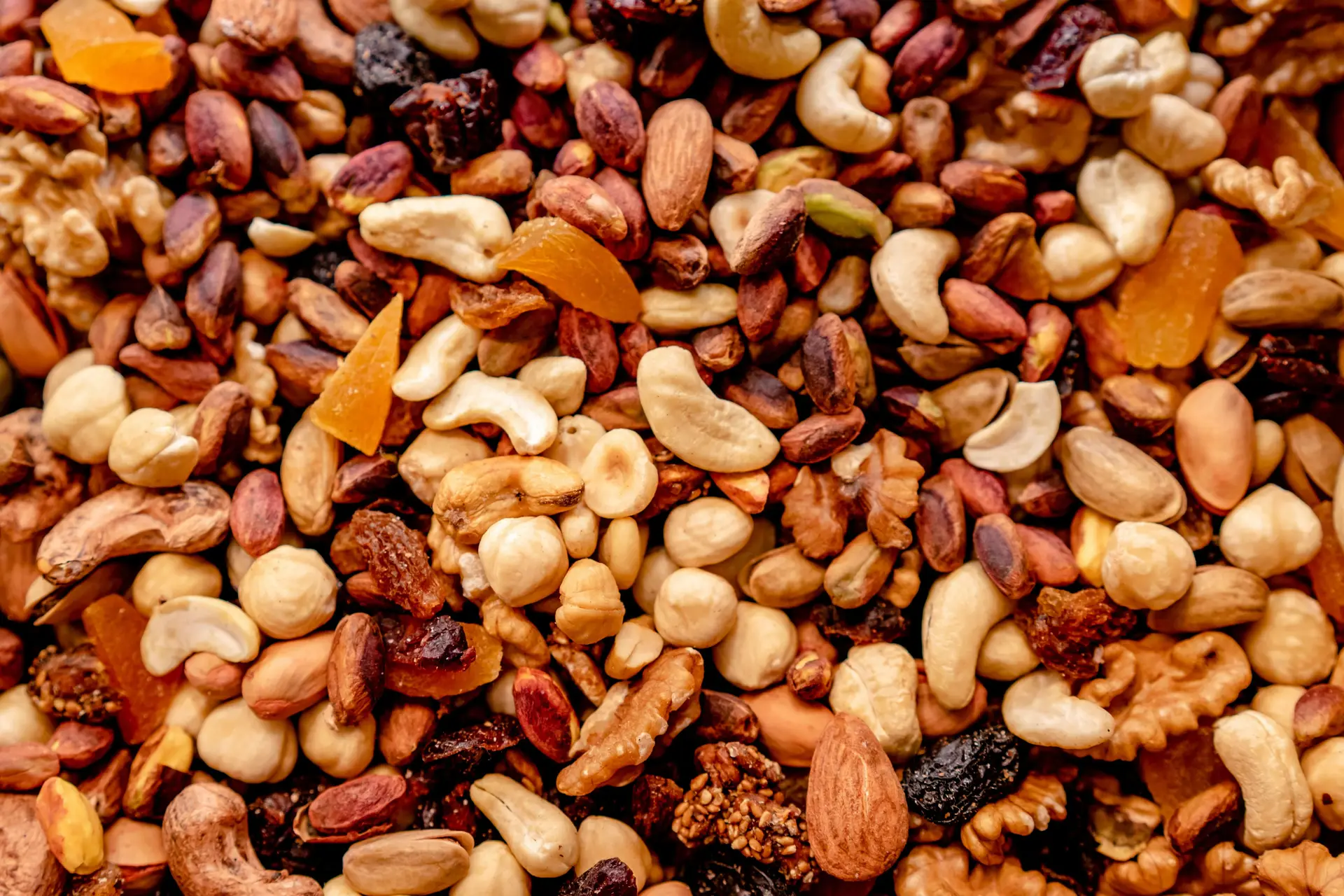 An assortment of different types of nuts and seeds.